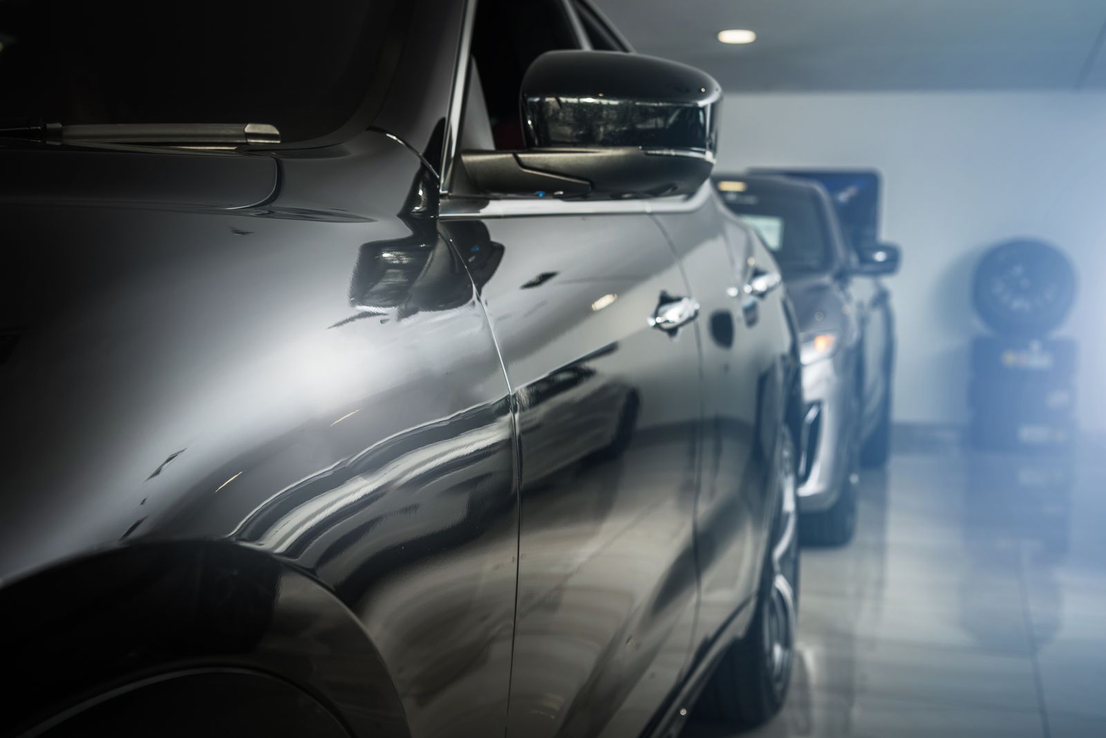 Finished glossy garage floor with cars